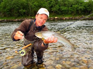 Jeff-Currier-with-Sea-Trout-in-Norway
