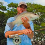 Snow Bound Angler Dreams of Warmer Climes