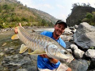Jeff Currier fly fishing for golden mahseer in Bhutan