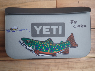 Jeff Currier artwork on Yeti packs