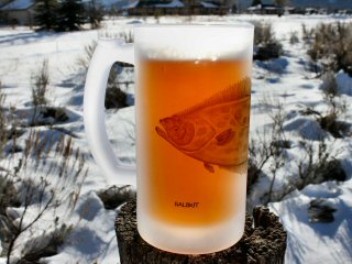 beer steins with fish art on them